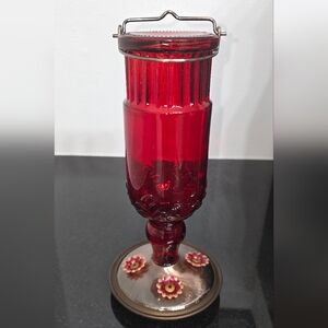 Red antique Hummingbird feeder